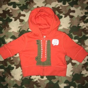 Three-quarter length zip hoodie.